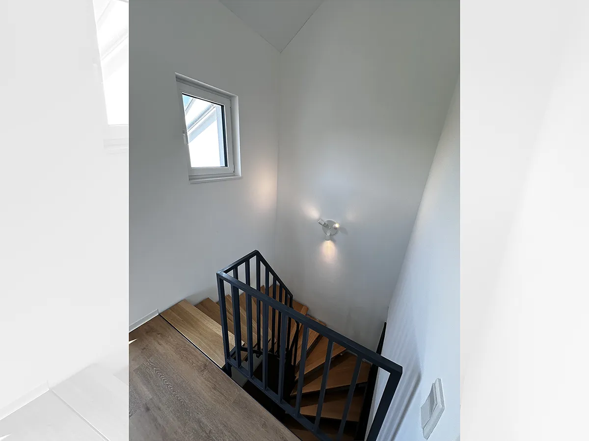 Staircase leading to the bedroom.